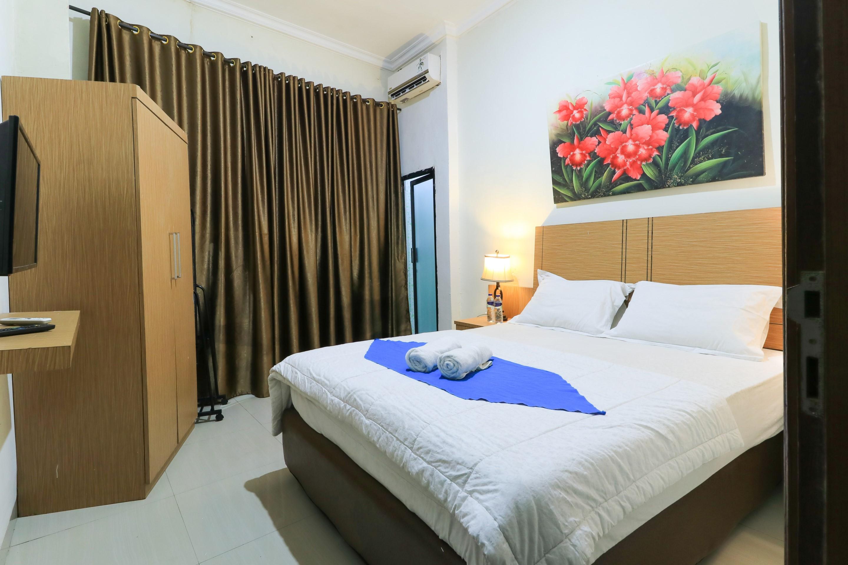 Labuana Homestay & Cafe Garden Makassar Exteriör bild